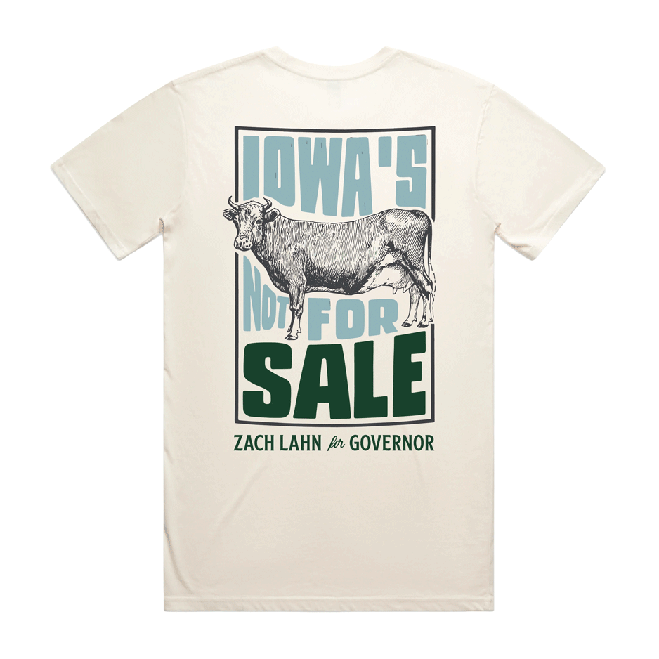 White t-shirt displaying "Iowa's Not For Sale" graphic featuring a black and white cow