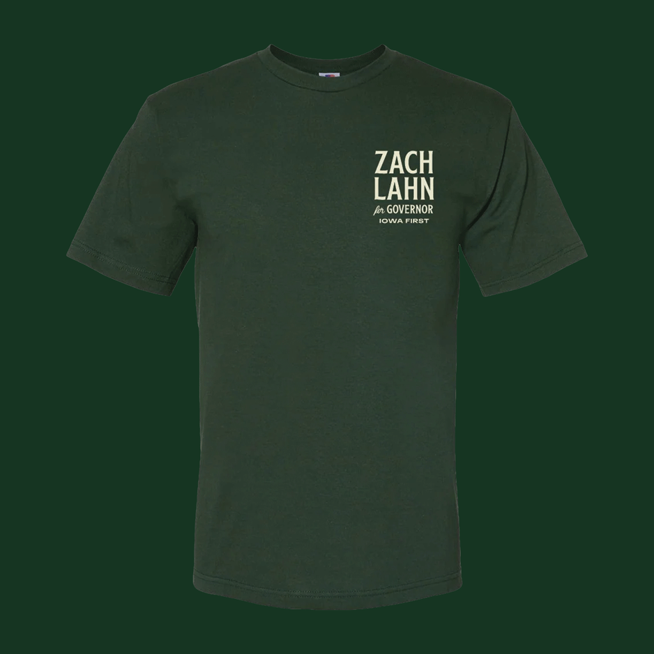 Dark green t-shirt displaying "Zach Lahn for Governor Iowa First" campaign branding, supporting Zach Lahn's